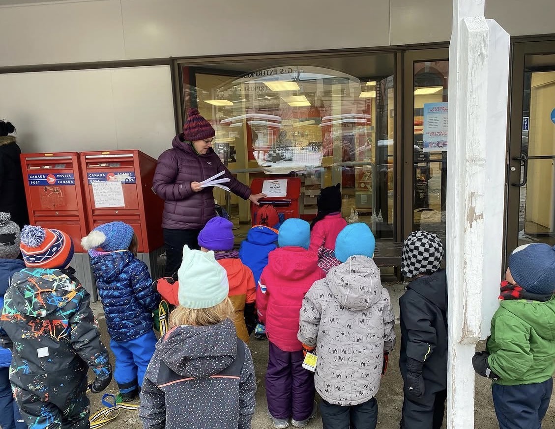 Little Me children visiting the Fernie post office on a winter community outing